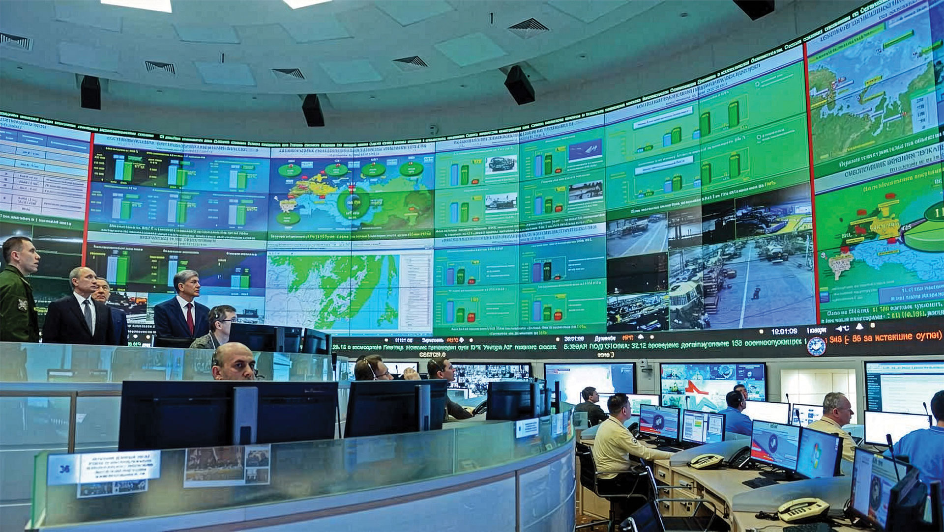 Curved video wall in a defence command hall with operators at desks